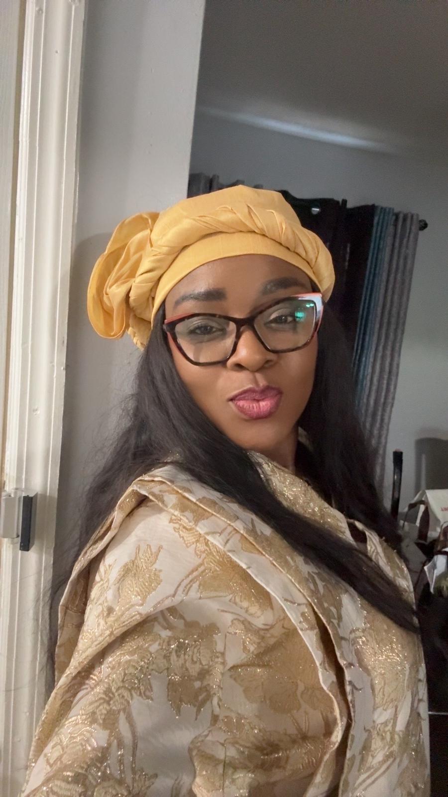 PeridotChozy client wearing a gold head scarf