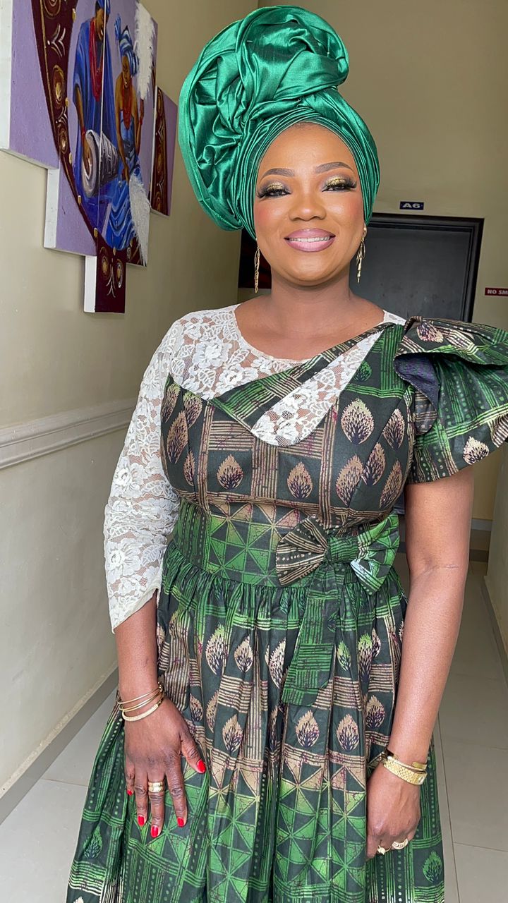 PeridotChozy client in traditional green attire